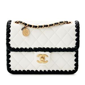 Authentic Chanel White and Black Quilted Lambskin Mini Flap Bag